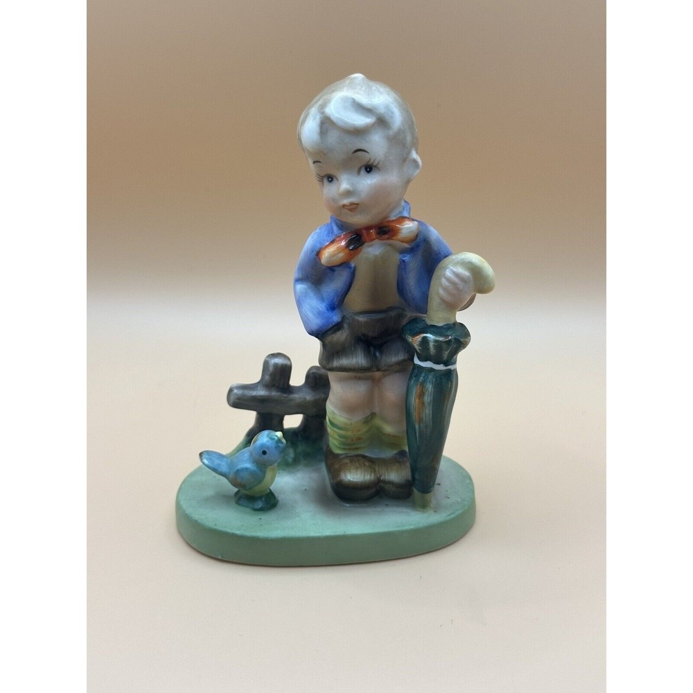 Vintage Figurine Of A Boy And A Bird Made In Japan